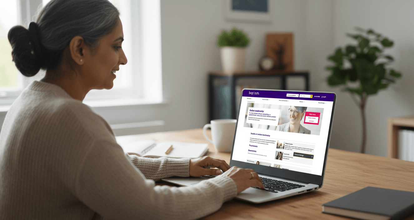 A professional certificate of BACP membership in a frame.