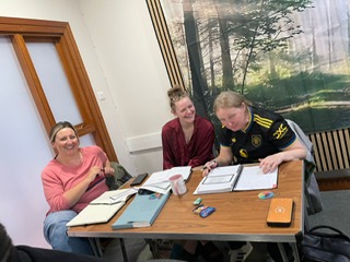 Something has made them laugh! Spontaneity, fun, good times at UK Therapy Guild,