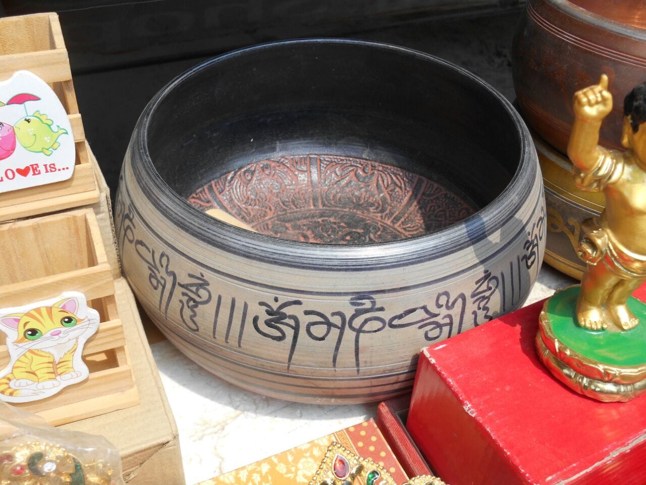The Transformative Power of Sound Baths: Healing Through Vibration 1 Tibetan singing bowl with engraved script for sound-bath therapy and wellbeing, used in counselling training in Liverpool