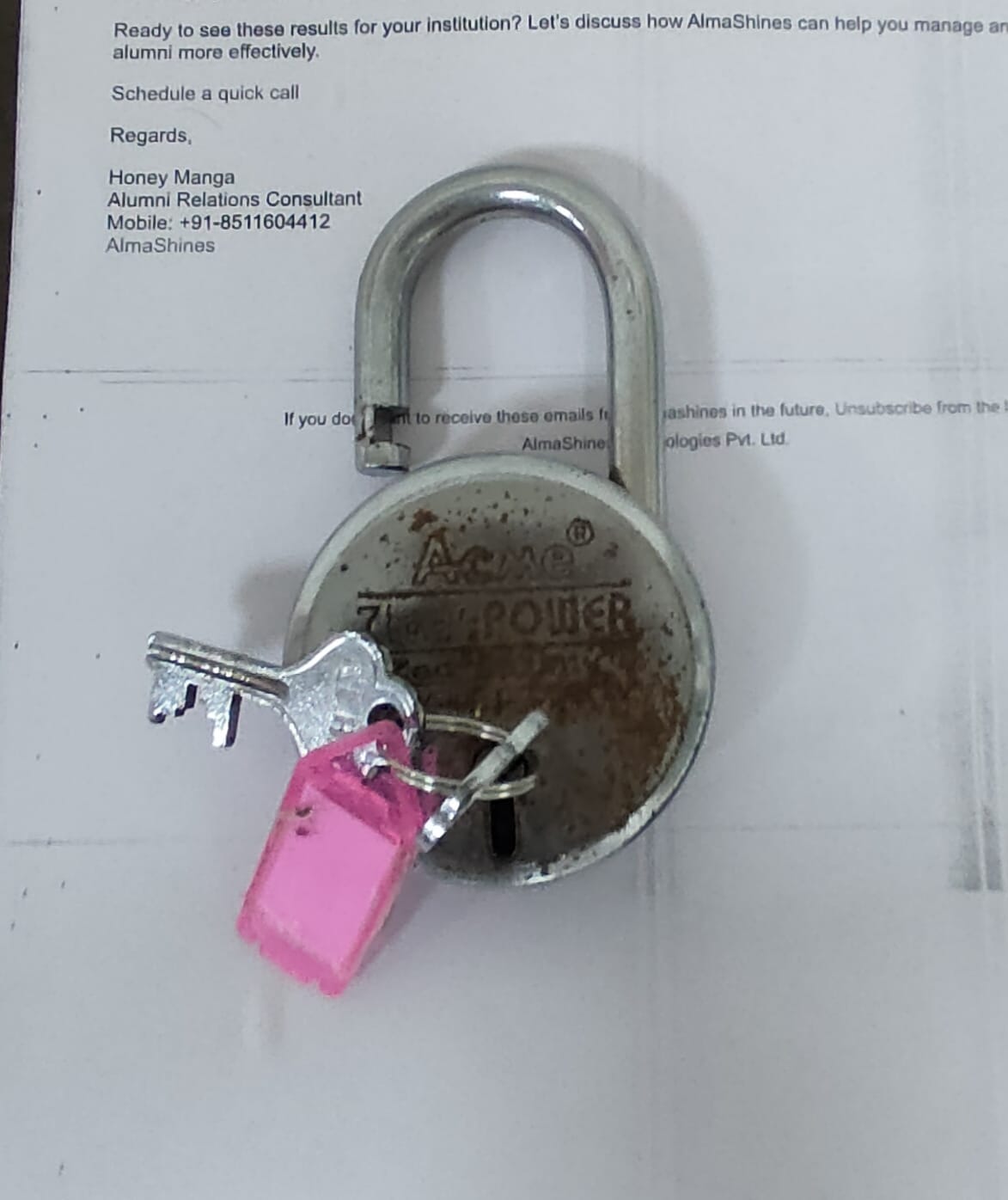 Confidentiality in Hypnotherapy Practice: Obligations, Limits, and Record-Keeping 3 Rusted open padlock with key and pink tag, symbolising professional boundaries for counselling training in Liverpool